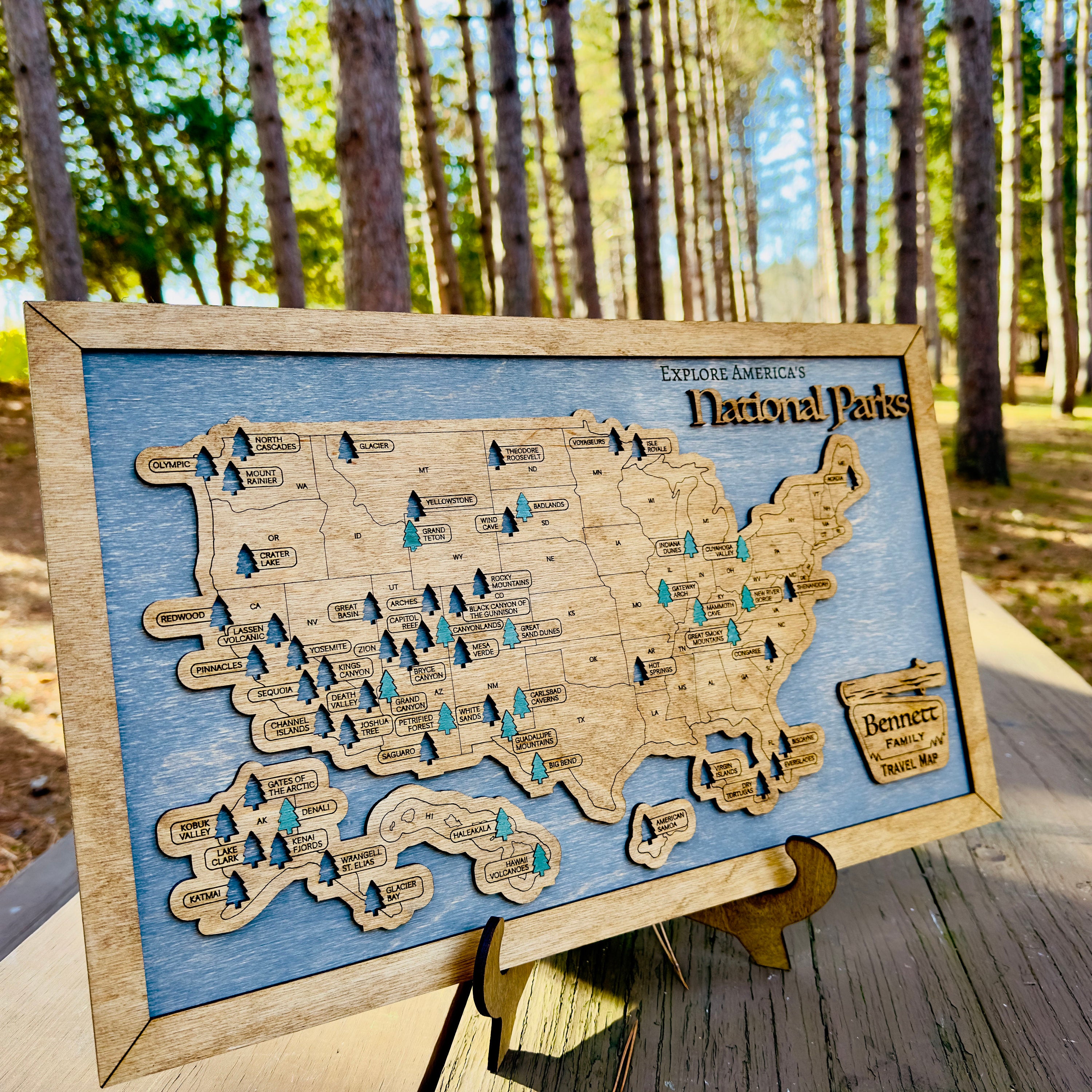 A handcrafted USA National Parks travel map displayed outdoors